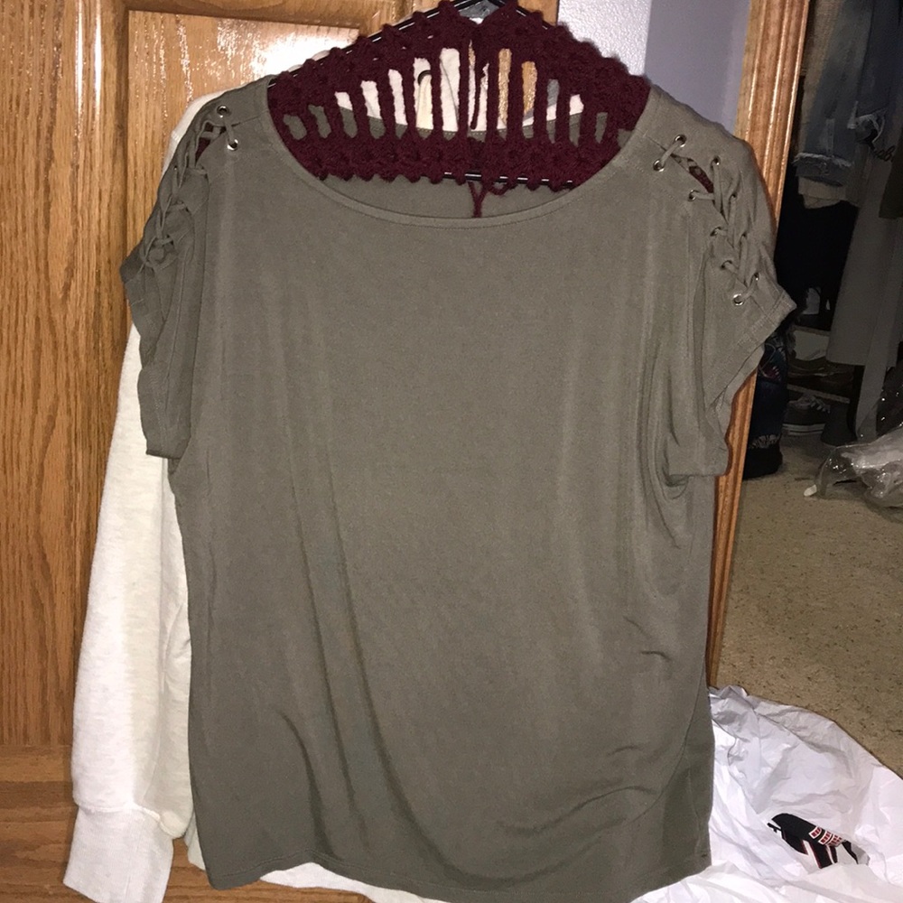 Green Shirt with design on sleeves